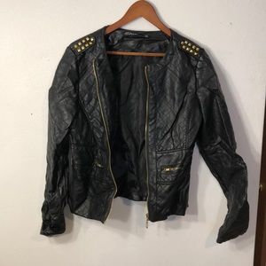 Black leather jacket with gold detail